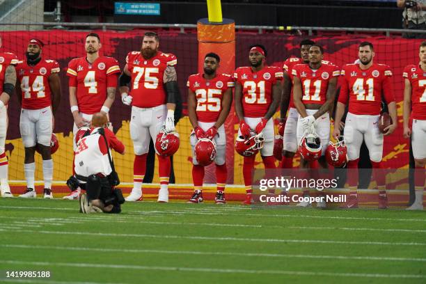 Kansas City Chiefs players stand during the national anthem prior to the NFL Super Bowl 55 football game against the Tampa Bay Buccaneers on February...