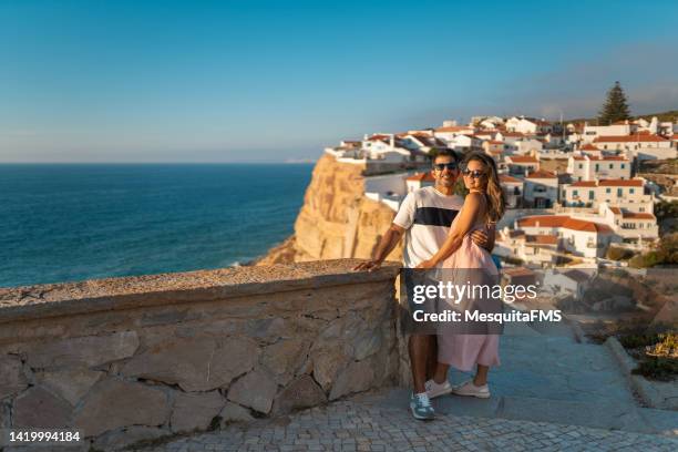 honeymoon couple in azenhas do mar - honeymoon europe stock pictures, royalty-free photos & images