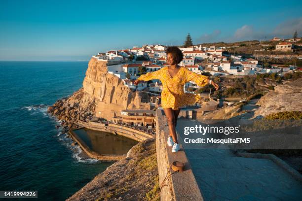 tourist enjoying vacation in azenhas do mar - portugal stock pictures, royalty-free photos & images