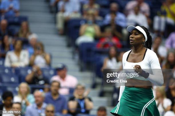 Venus Williams of reacts to a point with partner Serena Williams of the United States against Lucie Hradecka and Linda Noskova of Czech Republic...