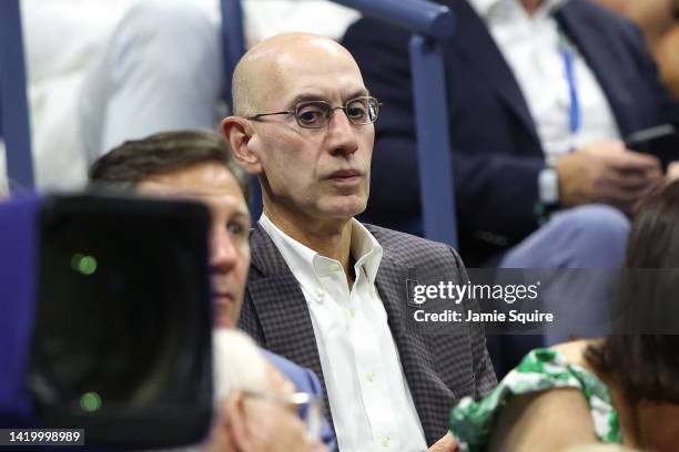 Commissioner Adam Silver watches the Women’s Doubles First Round match between Serena Williams and Venus Williams of The United States and Lucie...