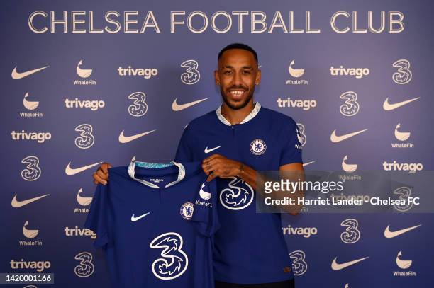 Pierre-Emerick Aubameyang poses for a photograph as he signs for Chelsea at Chelsea Training Ground on September 01, 2022 in Cobham, England.