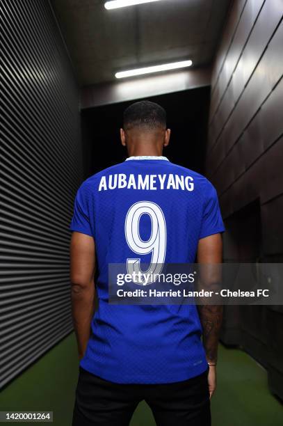 Pierre-Emerick Aubameyang poses for a photograph as he signs for Chelsea at Chelsea Training Ground on September 01, 2022 in Cobham, England.