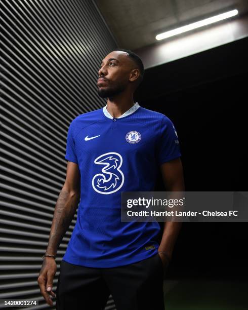 Pierre-Emerick Aubameyang poses for a photograph as he signs for Chelsea at Chelsea Training Ground on September 01, 2022 in Cobham, England.