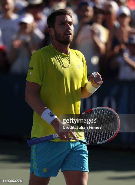 Cameron Norrie of Great Britain celebrates defeating Joao Sousa of Portugal during their Men's Singles Second Round match on Day Four of the 2022 US...