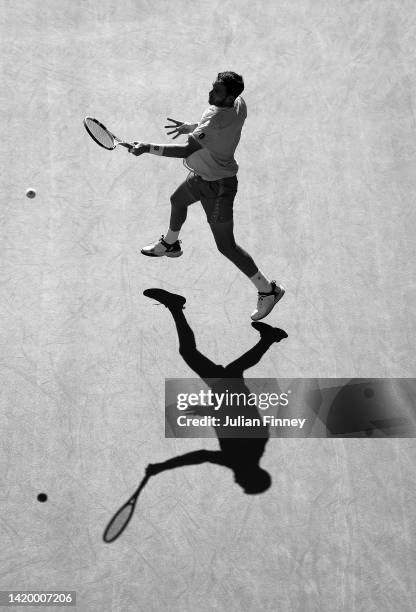 Cameron Norrie of Great Britain plays a forehand to Joao Sousa of Portugal during their Men's Singles Second Round match on Day Four of the 2022 US...