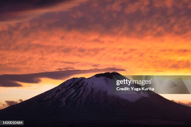 mt. iwate under a dramatic sky at sunset - 岩手山 ストックフォトと画像