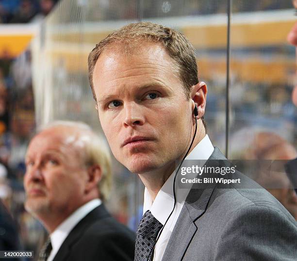 Assistant coach Kevyn Adams of the Buffalo Sabres watches the action against the Minnesota Wild at First Niagara Center on March 24, 2012 in Buffalo,...