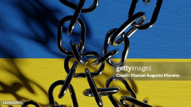 chained flag of ukraine - rebel flag backgrounds stock pictures, royalty-free photos & images