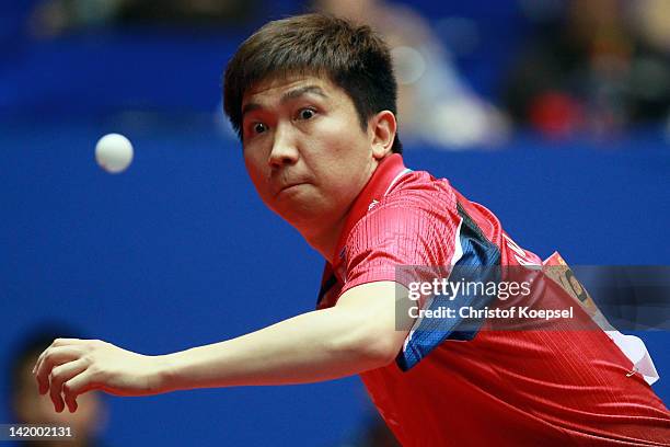 Ryu Seung Min of South Korea plays a forehand during his match against Stefan Fegerl of Austria during the LIEBHERR table tennis team world cup 2012...