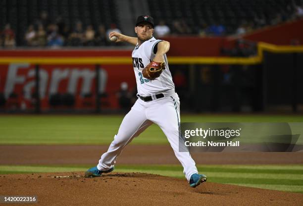 Merrill Kelly of the Arizona Diamondbacks delivers a first inning pitch against the Milwaukee Brewers at Chase Field on September 01, 2022 in...