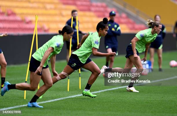 Mary Fowler runs through a training drill during an Australia Matildas training session at Suncorp Stadium on September 02, 2022 in Brisbane,...