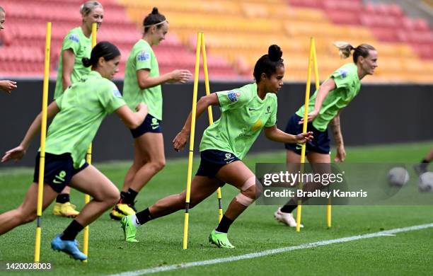 Mary Fowler runs through a training drill during an Australia Matildas training session at Suncorp Stadium on September 02, 2022 in Brisbane,...