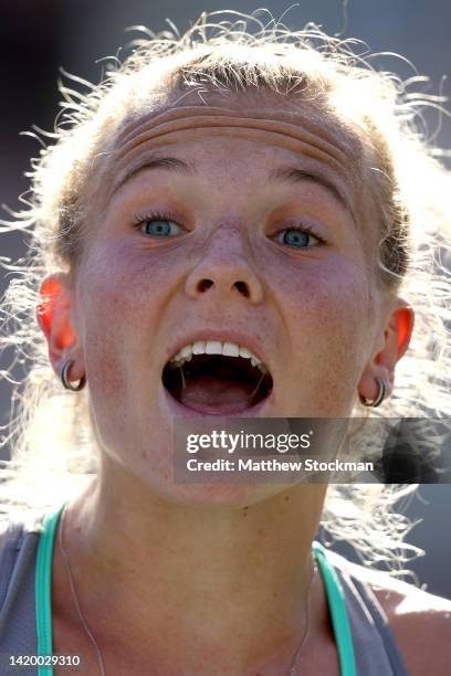 Katerina Siniakova of Czech Republic reacts against Alize Cornet of France during their Women's Singles Second Round match on Day Four of the 2022 US...
