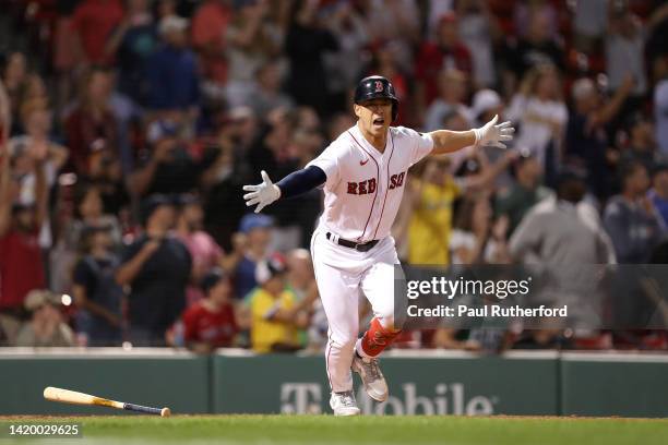 Rob Refsnyder of the Boston Red Sox hits a walk off RBI during the ninth inning against the Texas Rangers at Fenway Park on September 01, 2022 in...