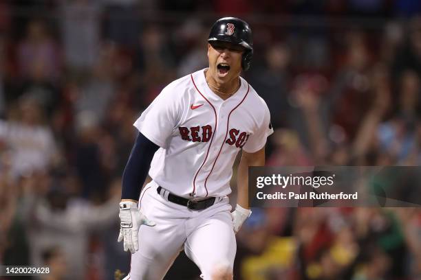 Rob Refsnyder of the Boston Red Sox hits a walk off RBI during the ninth inning against the Texas Rangers at Fenway Park on September 01, 2022 in...