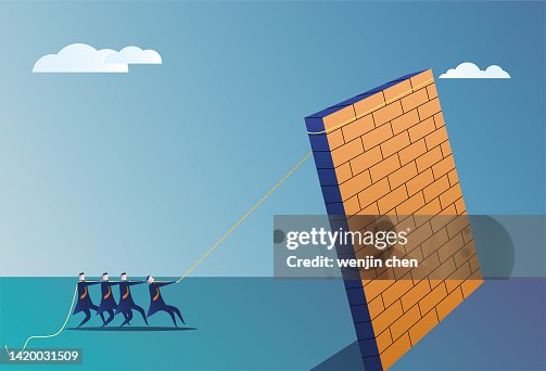People pull the wall down with ropes People pull the wall down with ropes