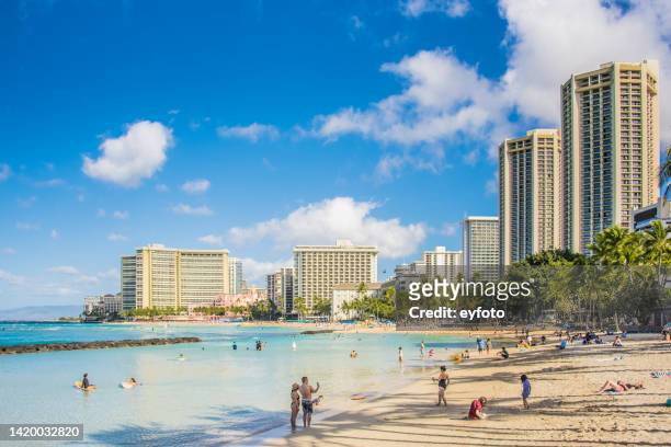 waikiki beach west view - honolulu culture stock pictures, royalty-free photos & images
