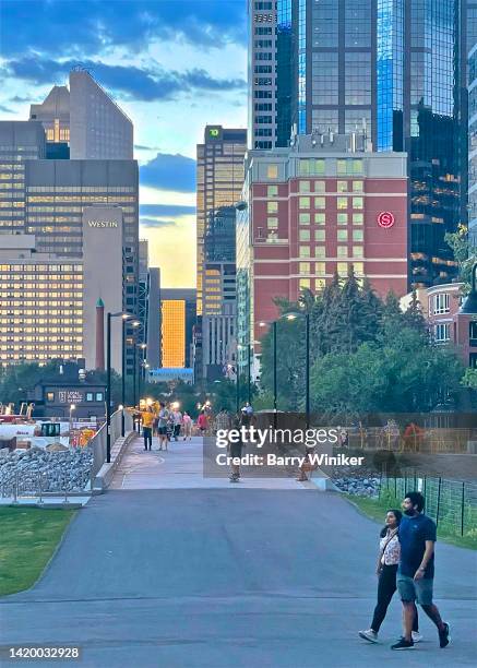 people in park near downtown calgary - calgary downtown stock pictures, royalty-free photos & images