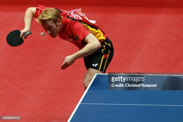 Christian Suess of Germany serves during his match against Marko Jevtovic of Serbia during the LIEBHERR table tennis team world cup 2012 championship...