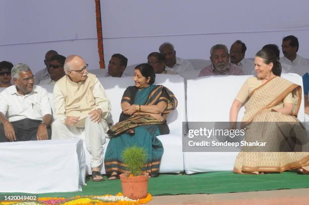 Communist Party of India General Secretary D Raja with right-wing hindu nationalist Bharatiya Janata Party leader Lal Krishna Advani and Sushma...