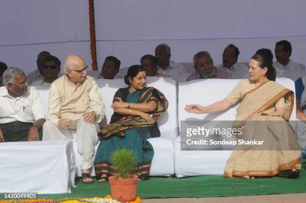 Communist Party of India General Secretary D Raja with right-wing hindu nationalist Bharatiya Janata Party leader Lal Krishna Advani and Sushma...
