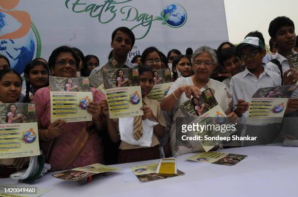 Delhi Chief Minister Sheila Dikshit enjoys painting and dance performed by school children during celebration of World Environment Day in New Delhi.