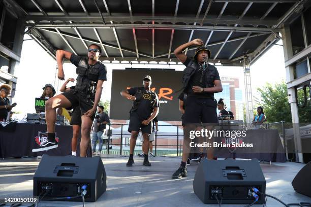 Members of Alpha Phi Alpha fraternity perform during the DTLR's HBCU Welcome Back Tour at Bowie State University on September 01, 2022 in Bowie,...