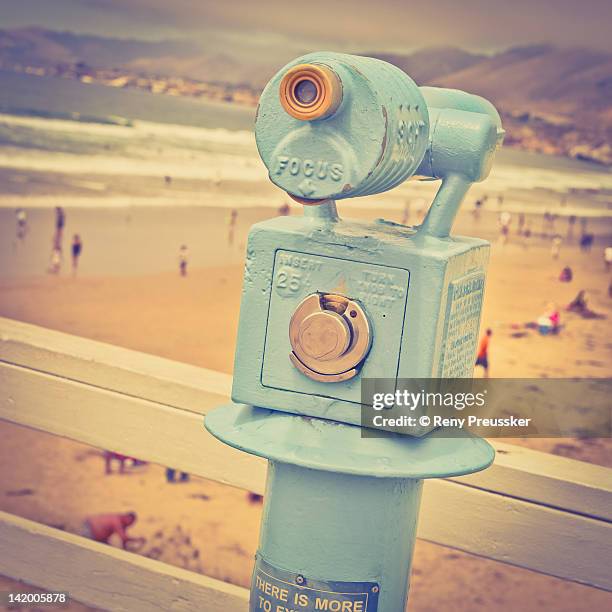 binoculars on beach pier - reny preussker foto e immagini stock