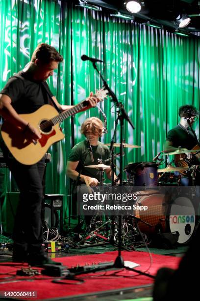Isaac Hanson and Zac Hanson of Hanson perform at An Evening With Hanson at The GRAMMY Museum on September 01, 2022 in Los Angeles, California.
