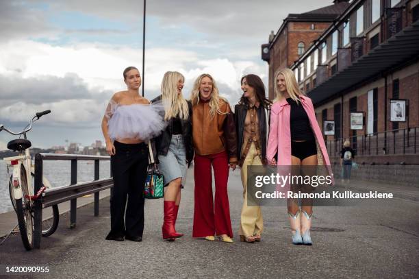 Guests walking outside Styles x Sellpy show in Stockholm fashion week Spring / Summer 2023 on September 01, 2022 in Stockholm, Sweden.