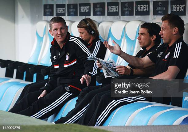 Bastian Schweinsteiger of Muenchen is seen on the bench prior to the UEFA Champions League Quarter Final first leg match between Olympique de...