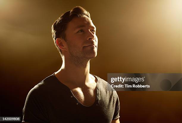 Young Man Looking Upwards, Foto de stock