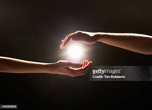 Light between hands.