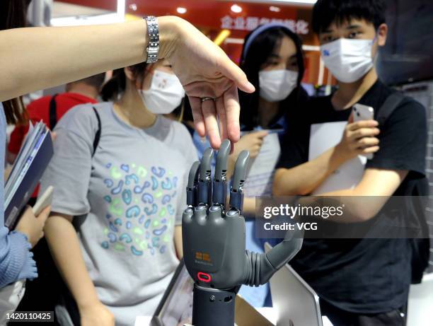 BrainRobotics prosthetic hand is on display during the 2022 World Artificial Intelligence Conference at the Shanghai World Expo Center on September...