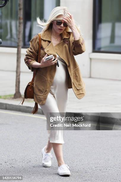 Mollie King arriving at BBC Radio One Studios on September 02, 2022 in London, England.