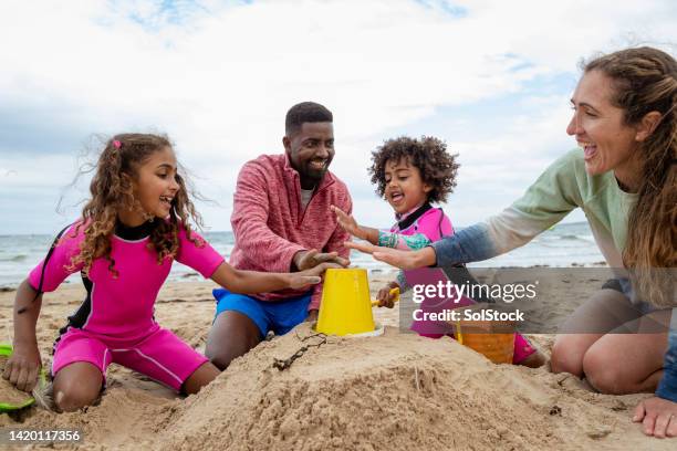 making the perfect sand castle - sand castle stock pictures, royalty-free photos & images