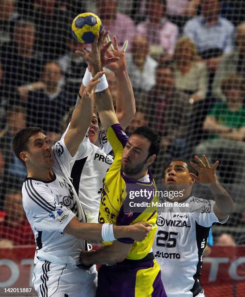 Marcus Ahlm of Kiel challens Iker Romero of Berlin during the Toyota Handball Bundesliga match between THW Kiel and Fuechse Berlin at Sparkassen...