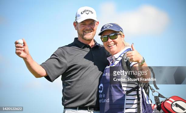David Drysdale of Scotland celebrates a hole in one with his caddy and wife Vicky Drysdale on the 10th hole during Day Two of the Made in HimmerLand...