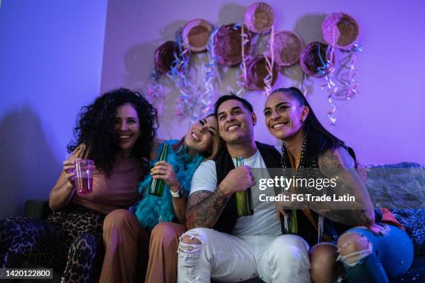 friends having a fun and drinking beer at party - friends tv show stock pictures, royalty-free photos & images