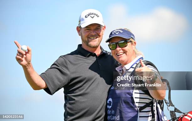 David Drysdale of Scotland celebrates a hole in one with his caddy and wife Vicky Drysdale on the 10th hole during Day Two of the Made in HimmerLand...
