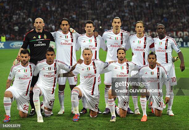 Milan's players pose prior the Champions League quarter-finals first leg football match AC Milan vs FC Barcelona on March 28, 2012 at San Siro...