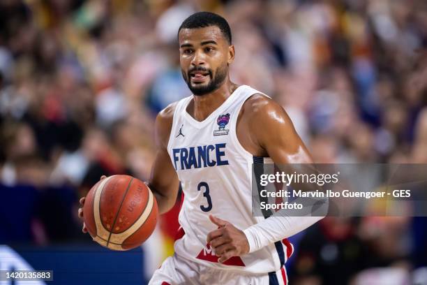 Timothe Luwawu-Cabarrot of France controls the ball during the FIBA EuroBasket 2022 group B match between France and Germany at Lanxess Arena on...