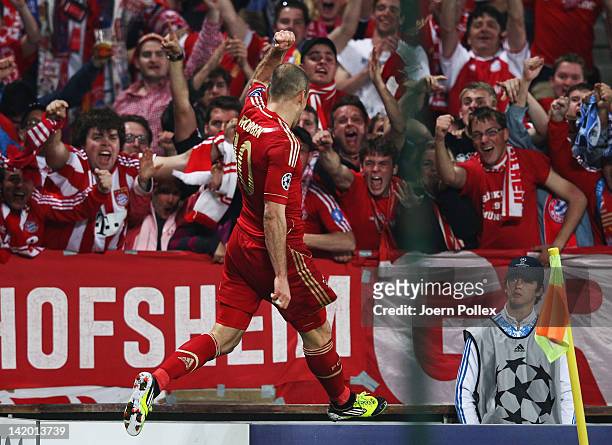 Arjen Robben of Muenchen celebrates after scoring his team's second goal during the UEFA Champions League Quarter Final first leg match between...