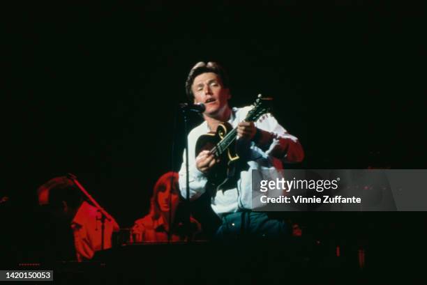 Steve Winwood performing on stage at Hammersmith Odeon in Hammersmith, London, United Kingdom, 15th June 1983.