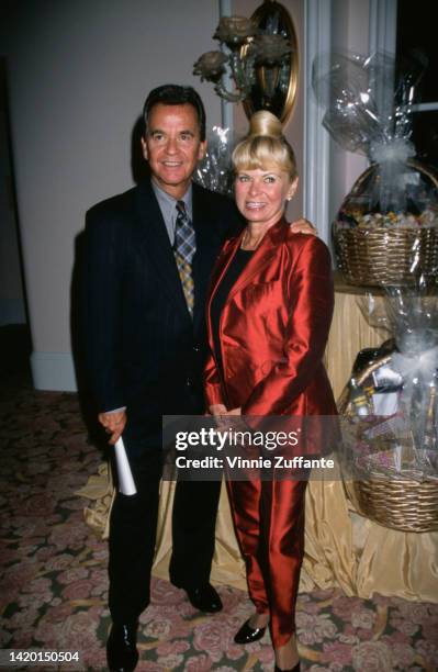 Dick Clark with his wife and actress Kari Clark at a pre-Emmy Awards party for nominees at the Beverly Hill Hotel in Beverly Hills, California,...