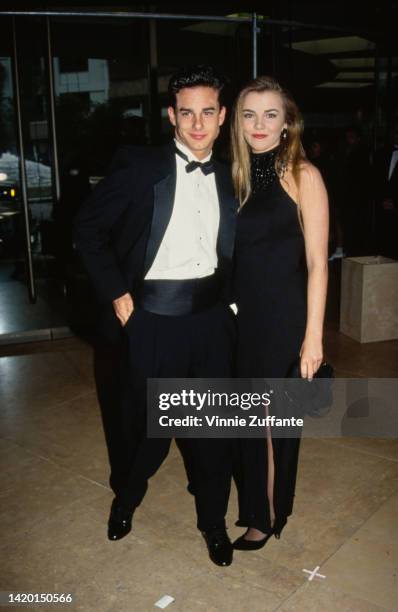 Christie Clark and Patrick Muldoon attend an event, United States, circa 1990s.