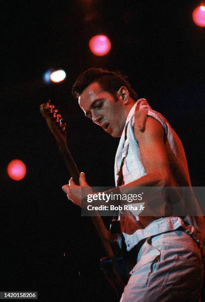 Paul Simonon of The Clash, plays guitar as he performs onstage during the US Festival at Glen Helen Regional Park, May 28, 1983 in Devore, California.