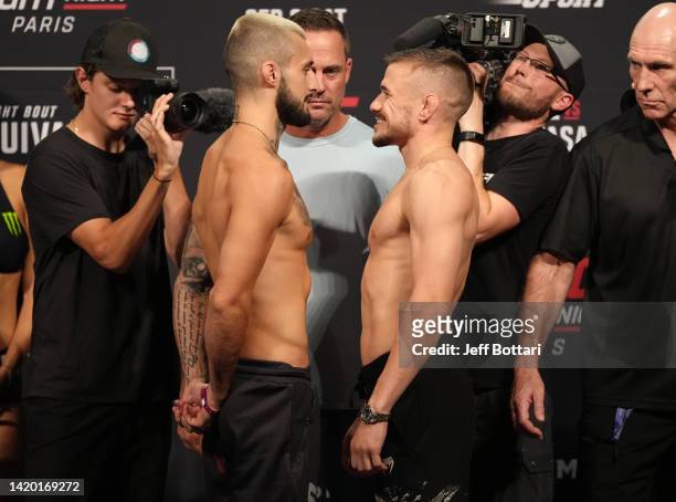 Opponents Charles Jourdain of Canada and Nathaniel Wood of England face off during the UFC Fight Night ceremonial weigh-in at The Accor Arena on...