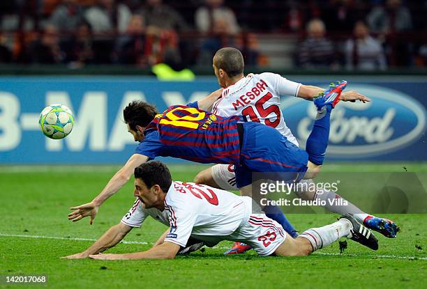 Daniele Bonera of AC Milan, Lionel Messi of Barcelona and Djamel Mesbah during the UEFA Champions League quarter final first leg match between AC...